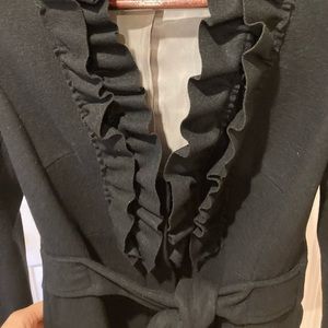 H & M ruffle-front, tie-closure wool jacket.